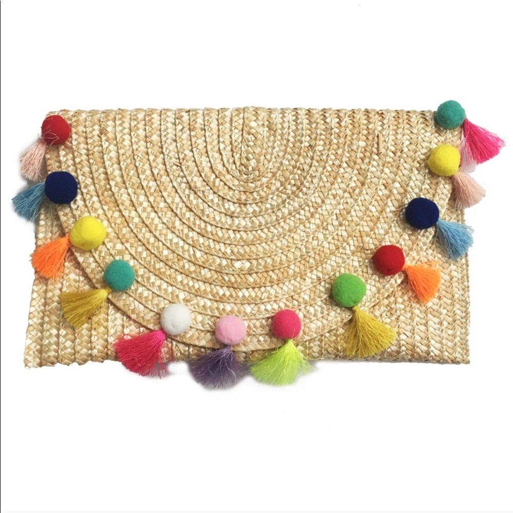 BEST SELLER! Straw pompom clutch!!